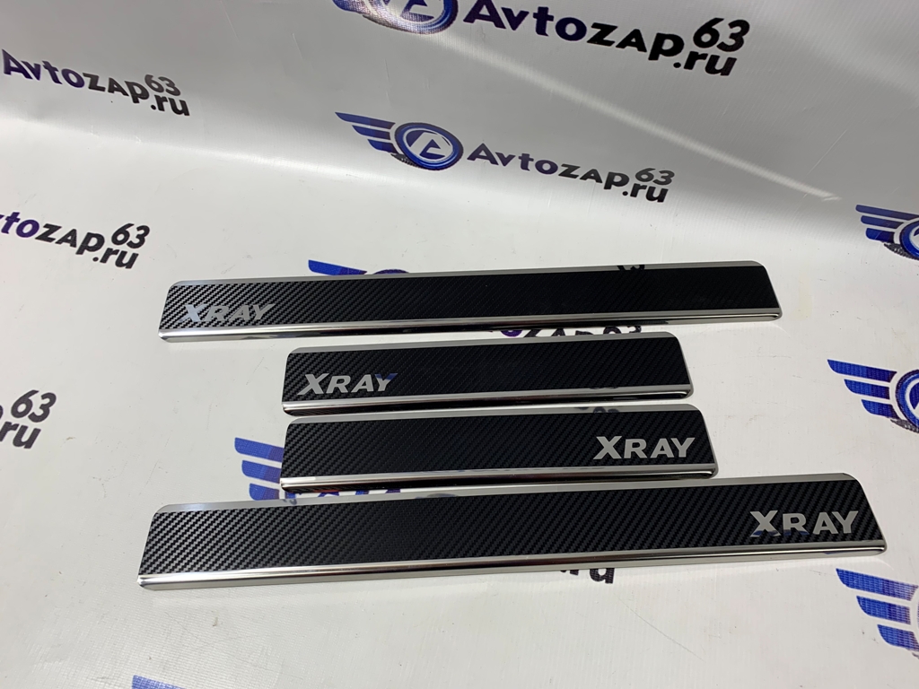 Накладки на пороги из нержавеющей стали (карбон) на  Иксрей
